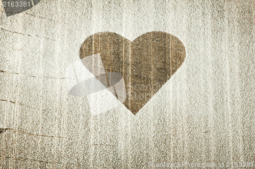 Image of Heart pattern on an old wooden board