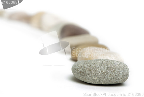 Image of Stacked stones white isolated