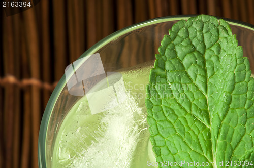 Image of Green cocktail with cubes ice