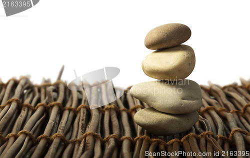 Image of Stacked stones on wooden base