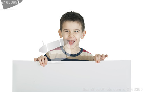 Image of Little boy holding a whiteboard