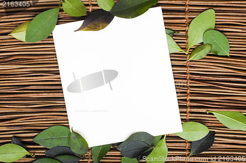 Image of Wooden background and leafs