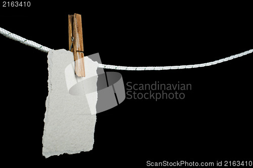 Image of Note papers hooked on a rope