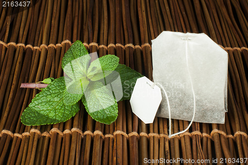 Image of Tea bag and fresh mint