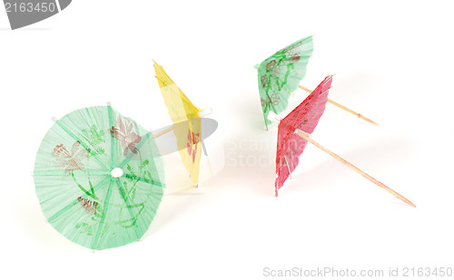 Image of Colorful cocktail umbrellas white isolated