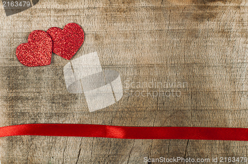 Image of Red ribbon tape and hearts