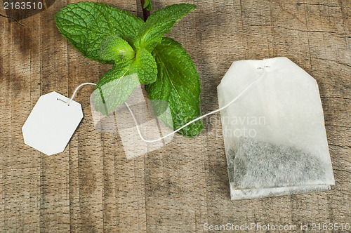 Image of Tea bag and fresh mint