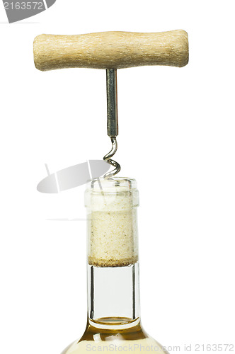 Image of A bottle of white wine and a corkscrew