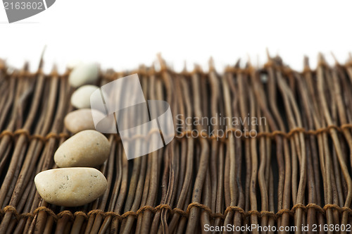 Image of Stacked stones on wooden base