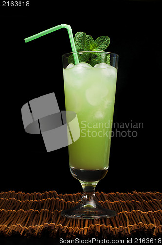 Image of Green cocktail with cubes ice