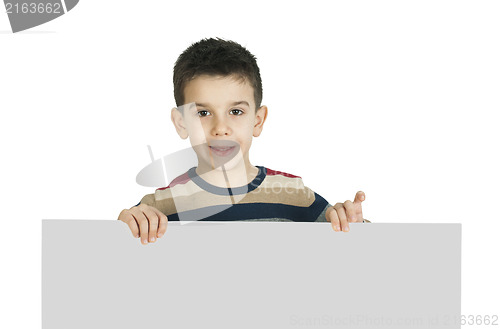 Image of Little boy holding a whiteboard