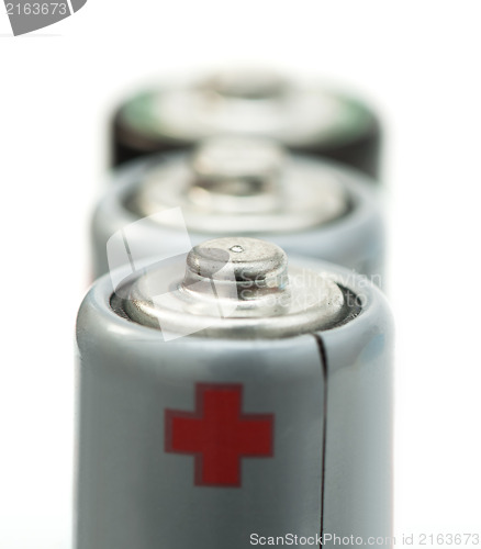 Image of Three batteries close up