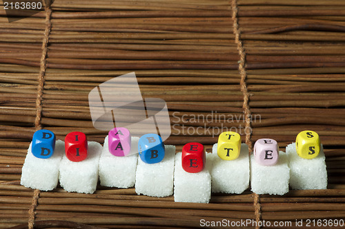 Image of Sugar lumps and word diabetes