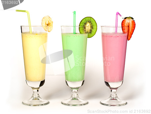 Image of Banana, kiwi and strawberry milk shake and fresh fruis