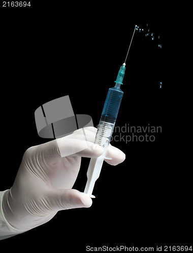 Image of Hand hold medical syringe