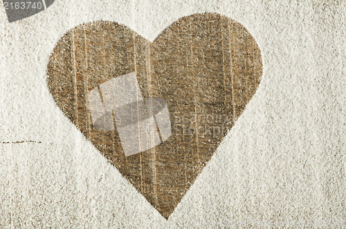 Image of Heart pattern on an old wooden board