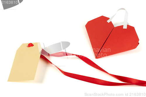 Image of Heart made ??of curled red paper and label