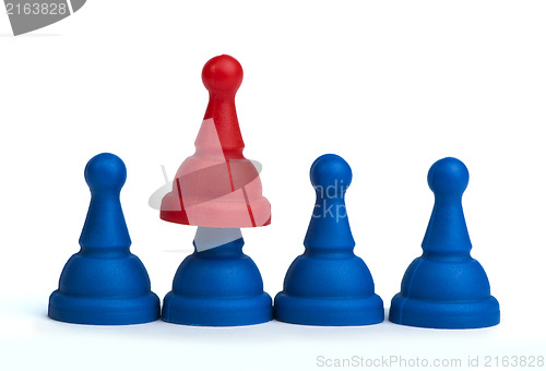 Image of Red and blue game pawns white isolated