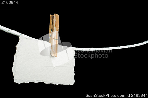 Image of Note paper hooked on a rope