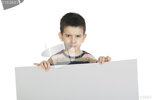 Image of Little boy holding a whiteboard