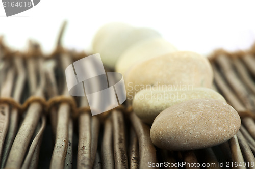 Image of Stacked stones on wooden base