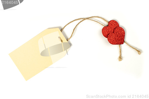 Image of Paper label with rope and red hearts