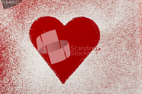 Image of Heart pattern on the bottom of a red bowl