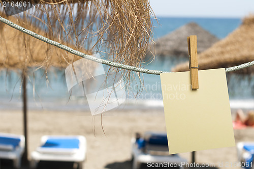 Image of Note papers hooked on a rope