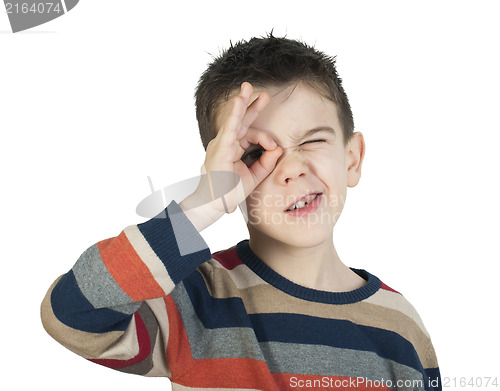 Image of Child looking through his ??hands