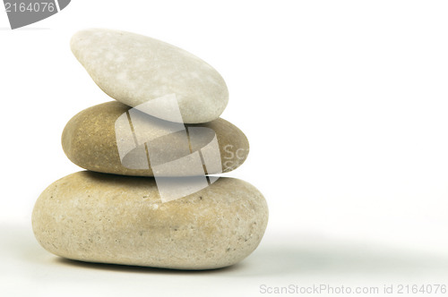 Image of Stacked stones white isolated