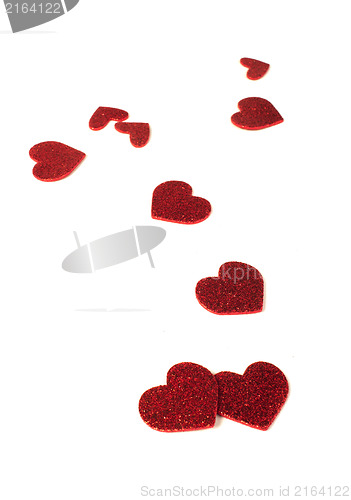 Image of Red shiny hearts on white background