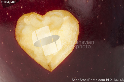 Image of Heart shape closeup carved in apple