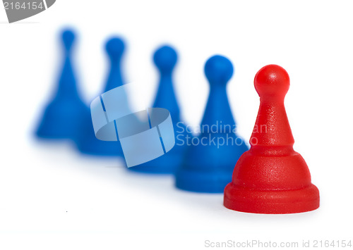 Image of Red and blue game pawns white isolated