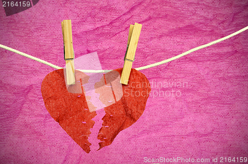 Image of Paper Heart divided into two parts