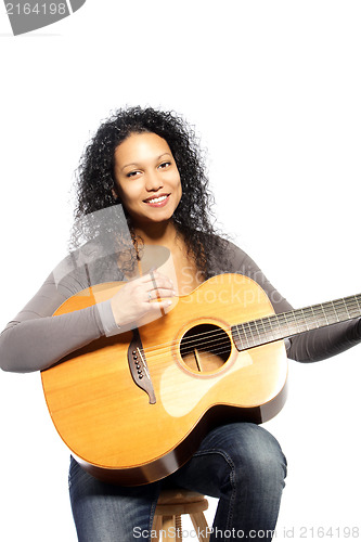 Image of Woman with guitar