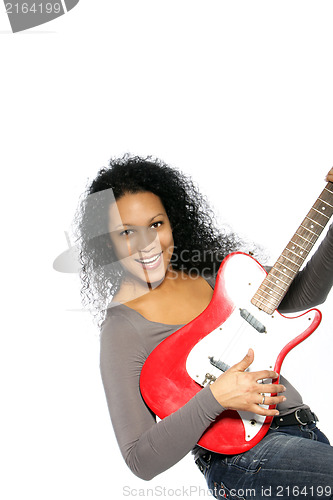 Image of Happy woman with guitar