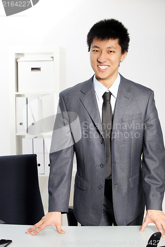 Image of Asian business man standing