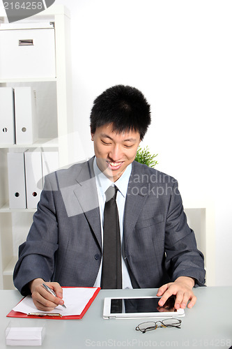 Image of Smiling Asian business man