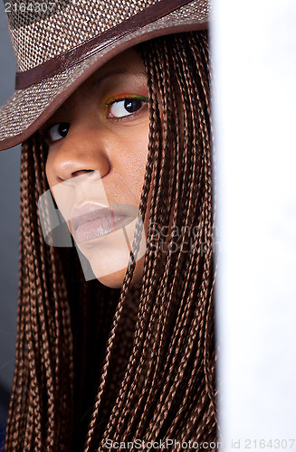 Image of young woman with African braids