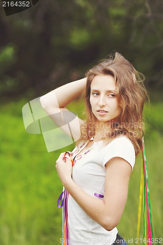 Image of Beautiful girl with ribbons