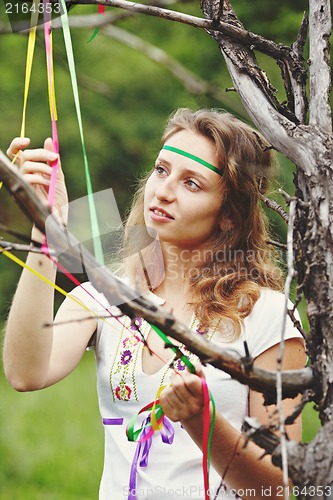 Image of Beautiful girl with ribbons