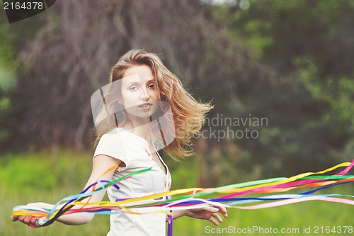 Image of Beautiful girl with ribbons