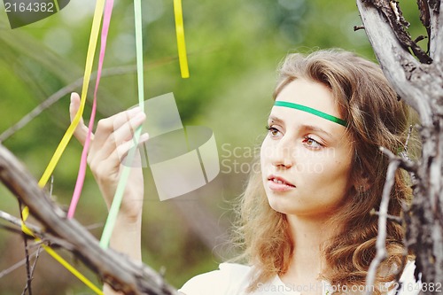 Image of Beautiful girl with ribbons