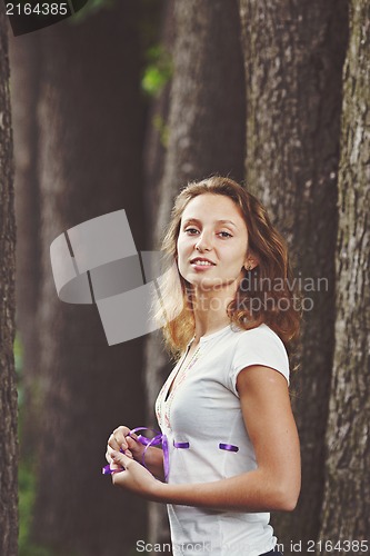 Image of Beautiful girl with ribbons