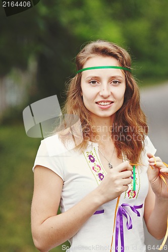 Image of Beautiful girl with ribbons