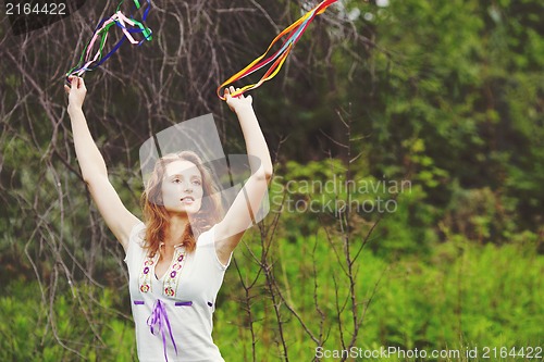 Image of Beautiful girl with ribbons