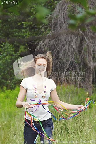 Image of Beautiful girl with ribbons