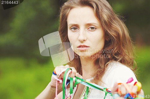 Image of Beautiful girl with ribbons