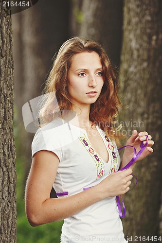 Image of Beautiful girl with ribbons