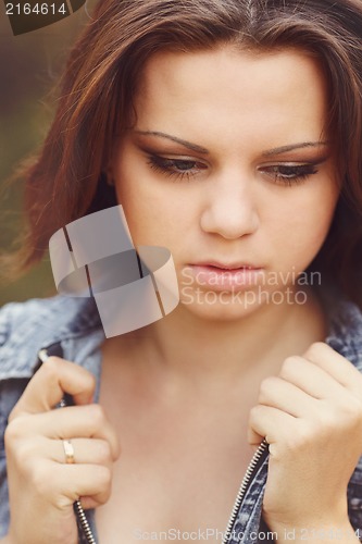 Image of Beautiful Girl on pine-wood